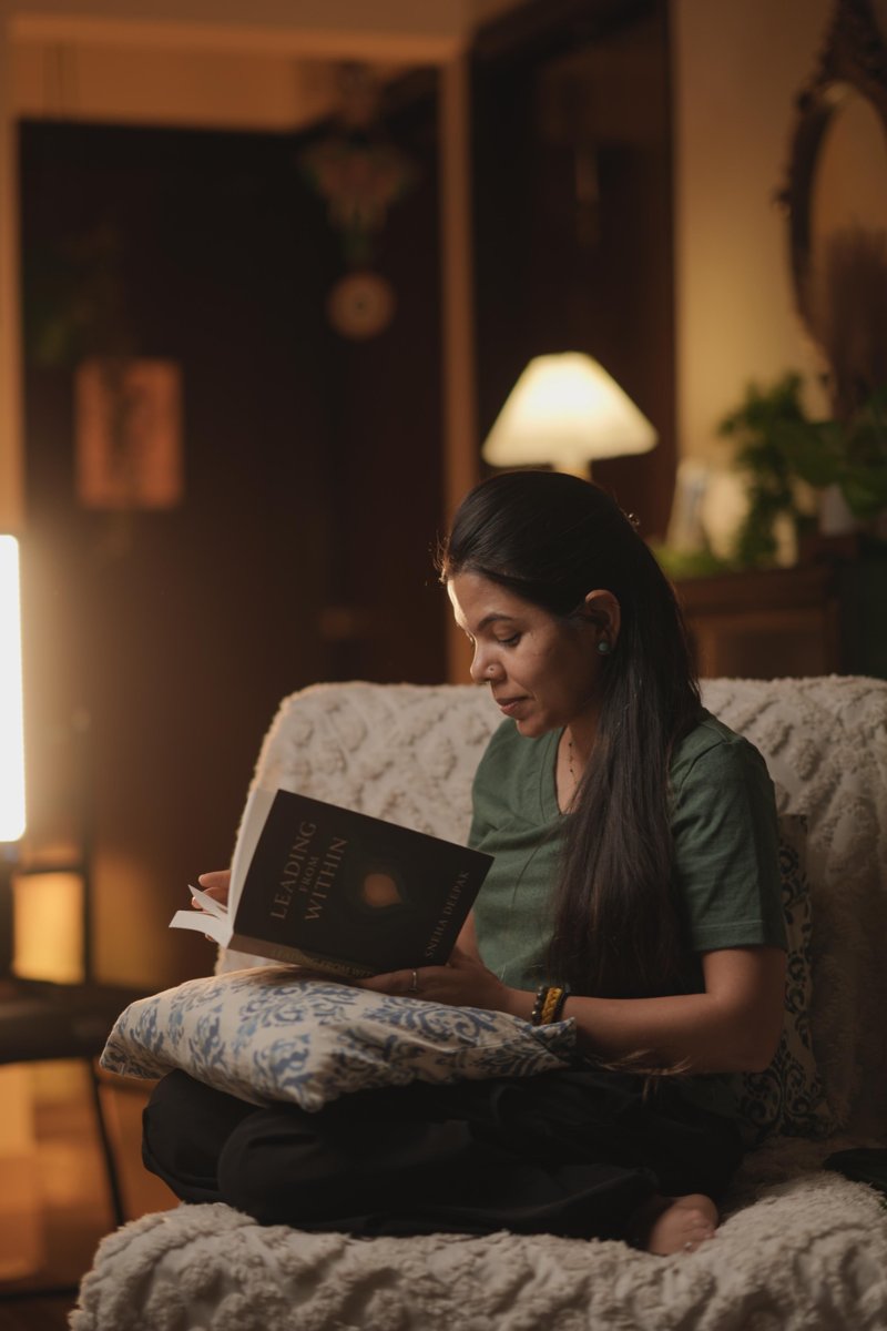 Anamika reading, in quiet study